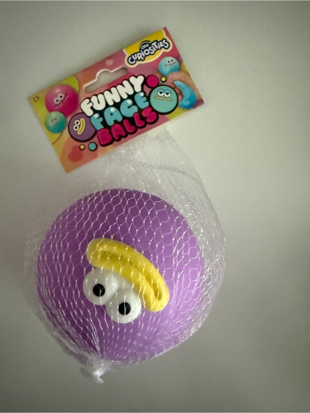 Face Balls-  Purplr Squeeze Ball